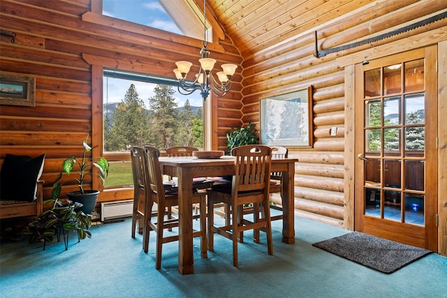 487 Hudson Ln, Victor, MT 59875 - carpeted dining area with a chandelier, wooden ceiling, rustic walls, healthy amount of natural light, and high vaulted ceiling