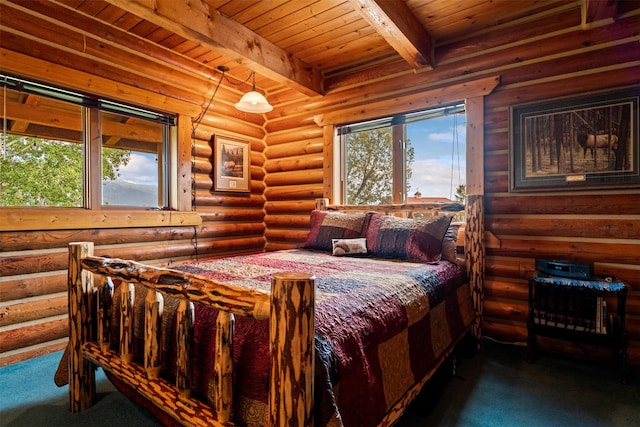 487 Hudson Ln, Victor, MT 59875 - carpeted bedroom featuring a wood ceiling with exposed beams and rustic walls