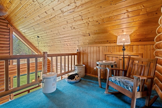 487 Hudson Ln, Victor, MT 59875 - bedroom with wooden ceiling, vaulted ceiling, rustic walls, and carpet floors