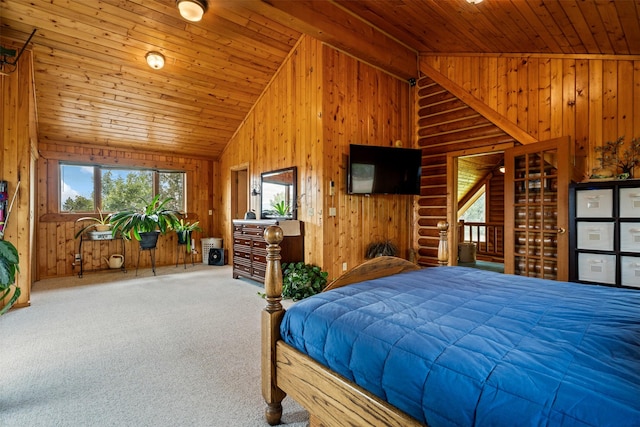 487 Hudson Ln, Victor, MT 59875 - carpeted bedroom with lofted ceiling, wooden walls, and wood ceiling