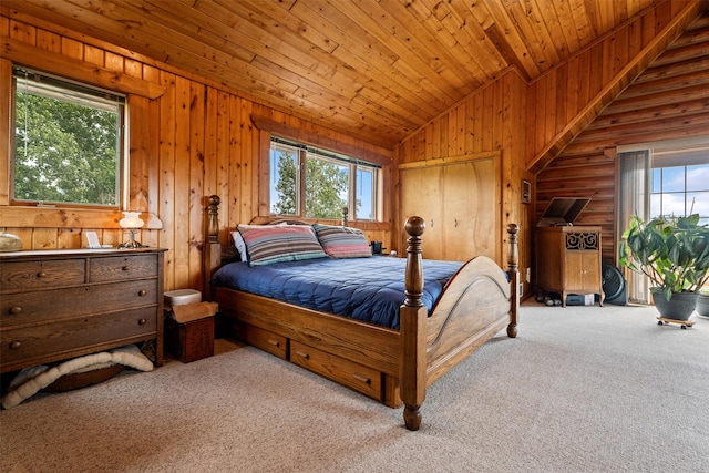 487 Hudson Ln, Victor, MT 59875 - bedroom featuring lofted ceiling, multiple windows, carpet floors, wood ceiling, and wood walls