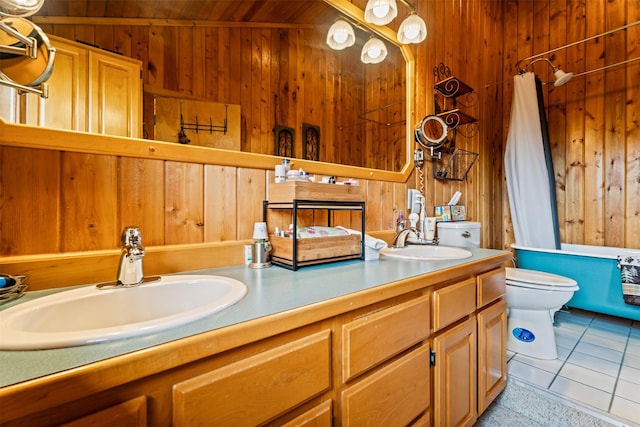 487 Hudson Ln, Victor, MT 59875 - bathroom featuring wooden walls, double vanity, wood ceiling, and tile patterned floors