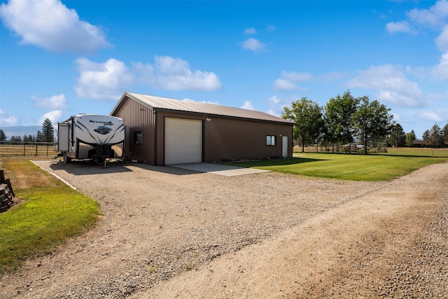487 Hudson Ln, Victor, MT 59875 - detached garage featuring driveway