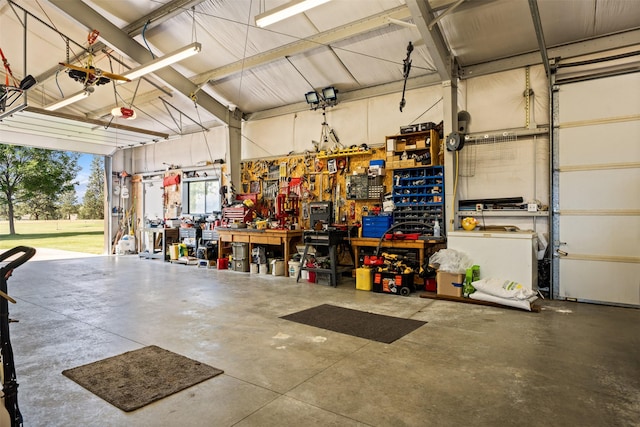 487 Hudson Ln, Victor, MT 59875 - garage featuring a workshop area