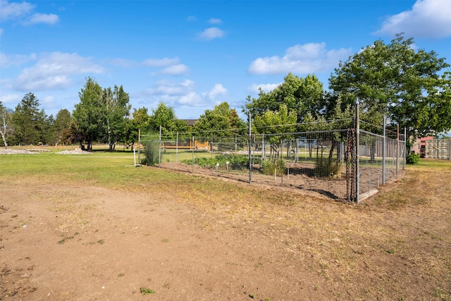 487 Hudson Ln, Victor, MT 59875 - view of community with a vegetable garden and a lawn
