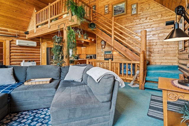 487 Hudson Ln, Victor, MT 59875 - carpeted living area featuring high vaulted ceiling, wood ceiling, wooden walls, a wall mounted AC, and stairs