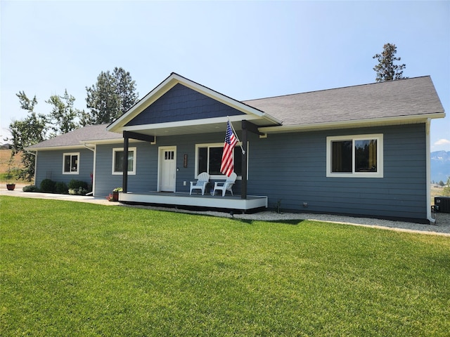5369 Sunnyvale Ct, Florence, MT 59833 - back of property with a lawn and a porch