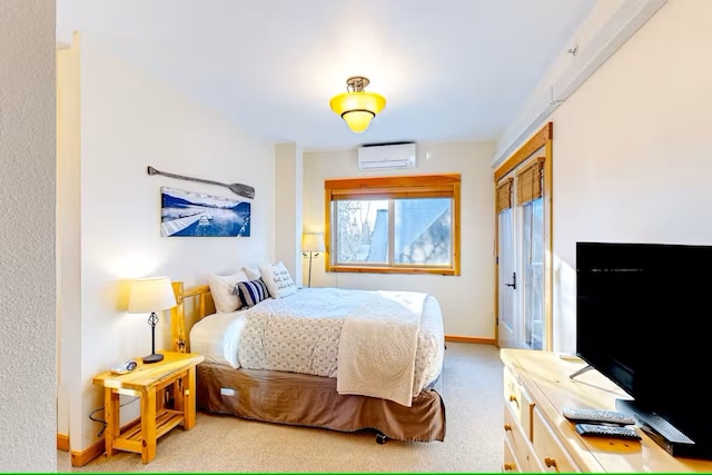 3832 Tamarack Ave Unit 2B, Whitefish, MT 59937 - carpeted bedroom featuring a wall mounted air conditioner and a closet