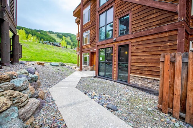 3832 Tamarack Ave Unit 2B, Whitefish, MT 59937 - doorway to property with stone siding