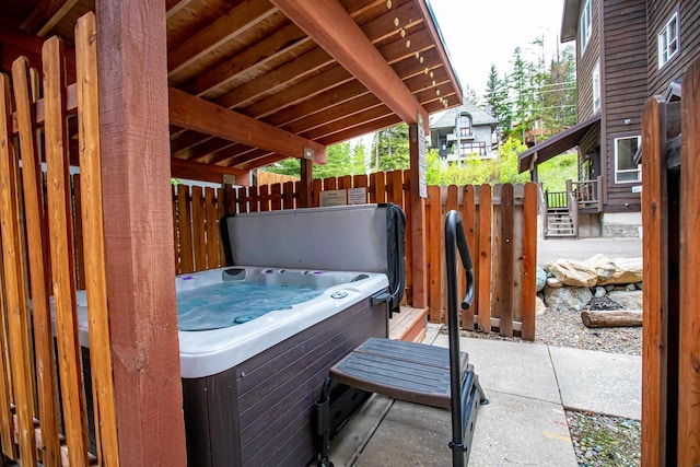 3832 Tamarack Ave Unit 2B, Whitefish, MT 59937 - view of patio featuring a hot tub