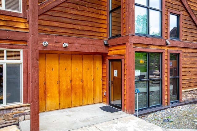 3832 Tamarack Ave Unit 2B, Whitefish, MT 59937 - view of exterior entry featuring board and batten siding