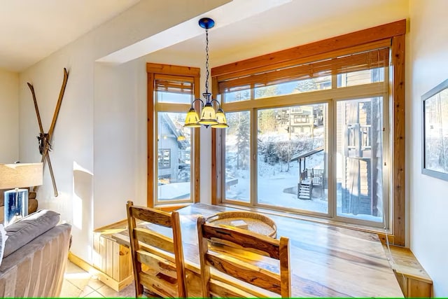 3832 Tamarack Ave Unit 2B, Whitefish, MT 59937 - dining area featuring a chandelier