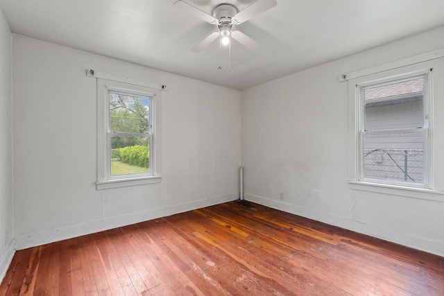 1307 4th St W, Kalispell, MT 59901 - spare room with hardwood / wood-style flooring and a ceiling fan
