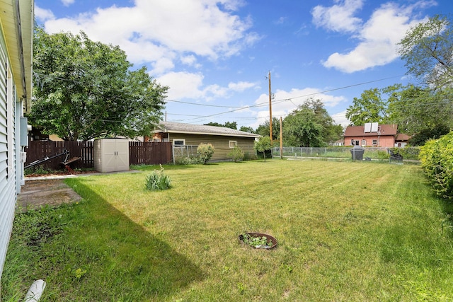 1307 4th St W, Kalispell, MT 59901 - fenced backyard with a storage unit