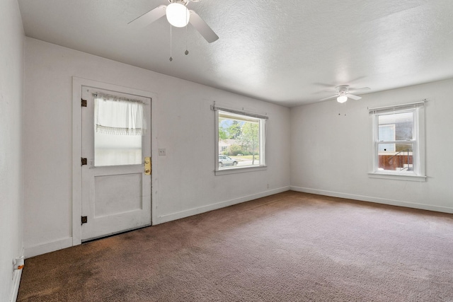 1307 4th St W, Kalispell, MT 59901 - unfurnished room with ceiling fan, carpet flooring, and a textured ceiling