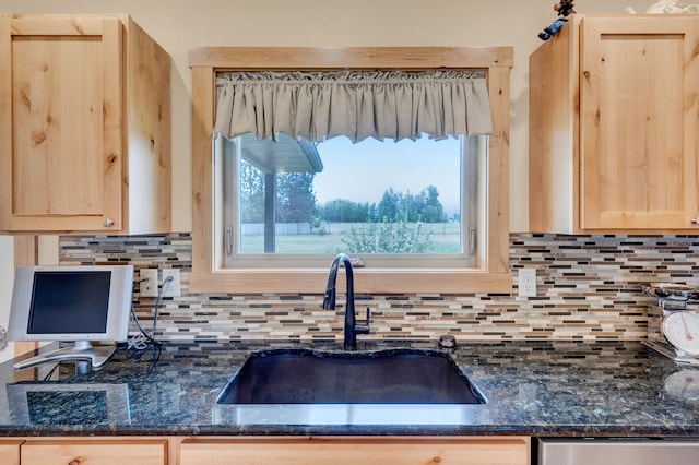 109 Como Vista Ln, Hamilton, MT 59840 - kitchen with light brown cabinets, tasteful backsplash, and stainless steel dishwasher