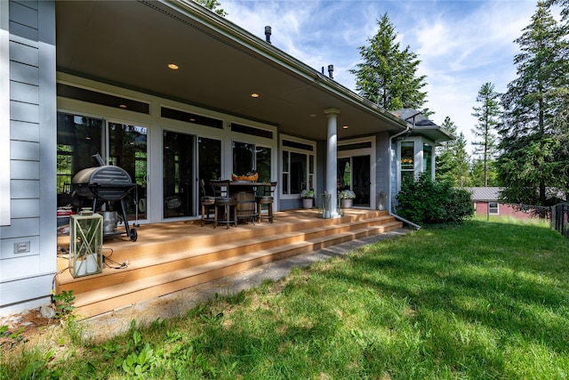 20245 Swan View Rd, Rollins, MT 59931 - deck with a lawn and grilling area
