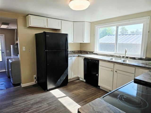 1111 6th Ave NW, Great Falls, MT 59404 - kitchen featuring black appliances, dark wood finished floors, white cabinets, washer and dryer, and water heater