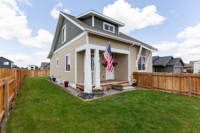 618 W Adams St, Three Forks, MT 59752 - view of front of house featuring a porch, a fenced backyard, and roof with shingles