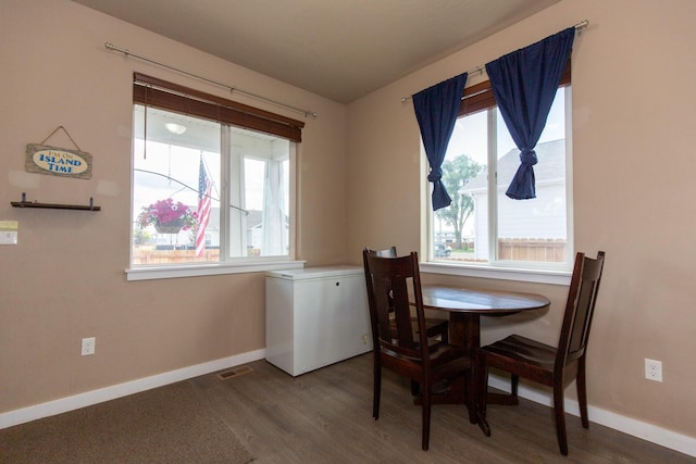 618 W Adams St, Three Forks, MT 59752 - dining room with baseboards and wood finished floors