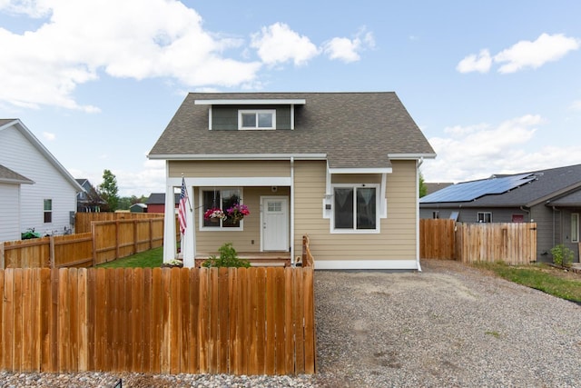 618 W Adams St, Three Forks, MT 59752 - bungalow-style home with roof with shingles and a fenced front yard