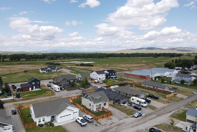 618 W Adams St, Three Forks, MT 59752 - aerial perspective of suburban area featuring a mountain backdrop