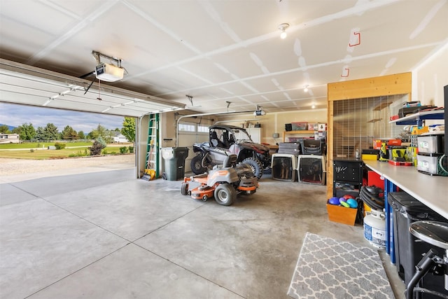 4460 Sunburst Ln, Stevensville, MT 59870 - garage featuring a garage door opener