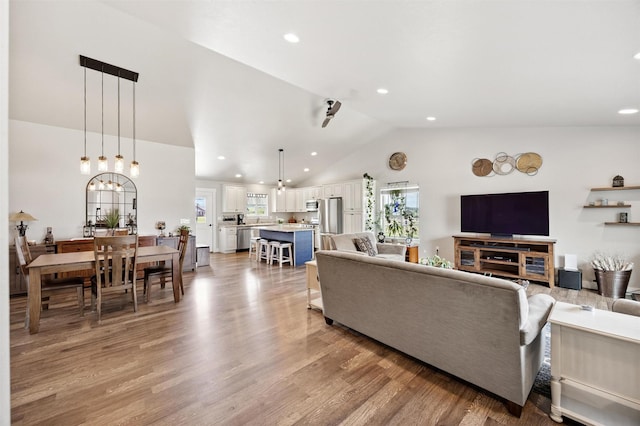 4460 Sunburst Ln, Stevensville, MT 59870 - living room featuring recessed lighting, light wood-style floors, and high vaulted ceiling