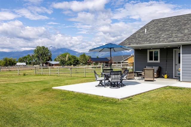 4460 Sunburst Ln, Stevensville, MT 59870 - view of yard with a patio area and a mountain view