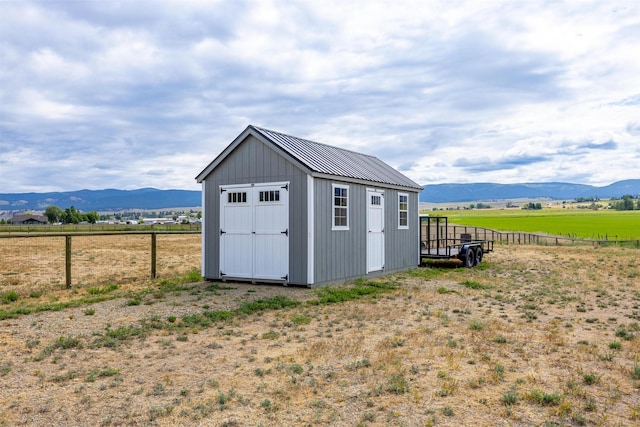 4460 Sunburst Ln, Stevensville, MT 59870 - view of shed with a mountain view and a view of rural / pastoral area
