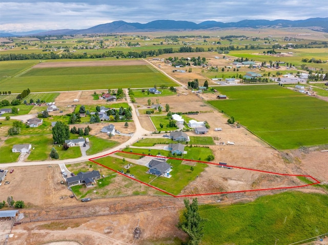 4460 Sunburst Ln, Stevensville, MT 59870 - view of rural area with a mountain backdrop and property boundaries highlighted