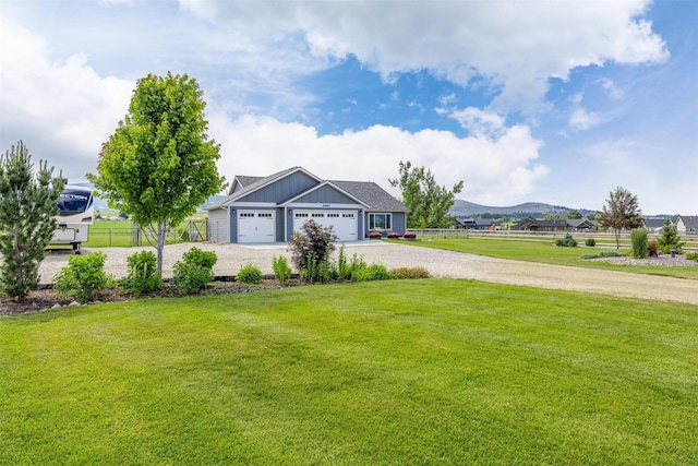 4460 Sunburst Ln, Stevensville, MT 59870 - craftsman house with driveway, a garage, and board and batten siding