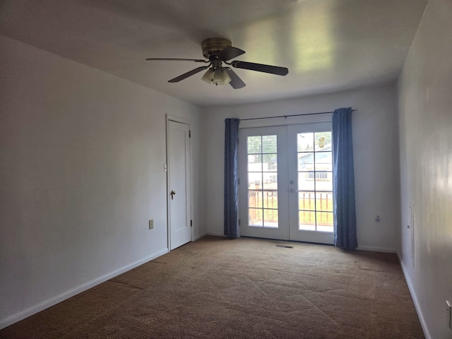 3017 5th Ave N, Great Falls, MT 59401 - empty room featuring carpet flooring, french doors, and a ceiling fan