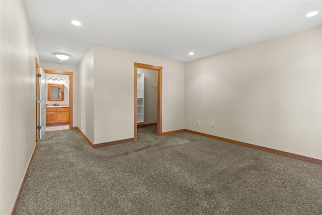 103 Crescent Lndg, Polson, MT 59860 - carpeted empty room with a sink and recessed lighting
