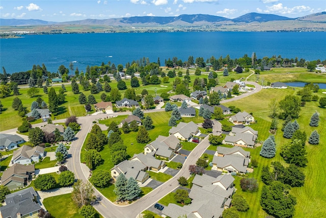 103 Crescent Lndg, Polson, MT 59860 - aerial perspective of suburban area featuring a water and mountain view