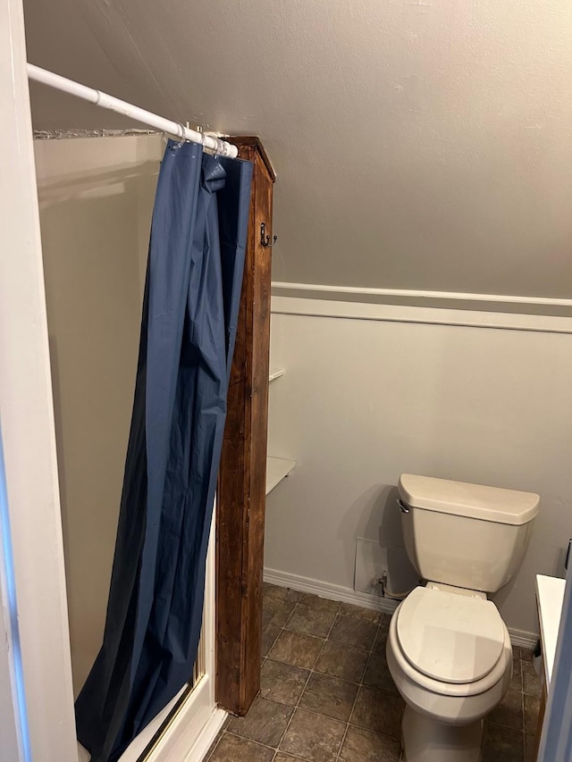 645 Morrell Creek Dr, Seeley Lake, MT 59868 - bathroom featuring a shower stall and toilet