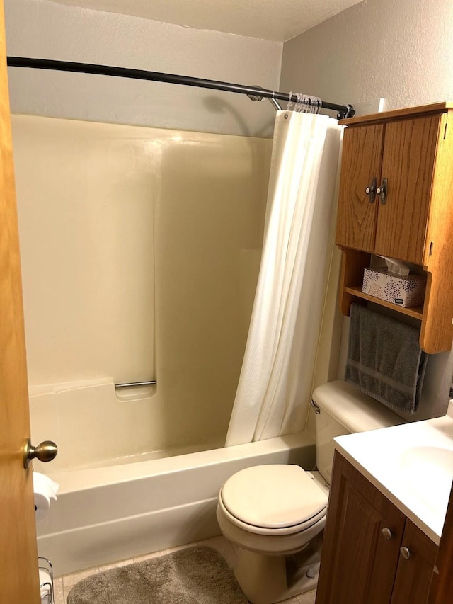 645 Morrell Creek Dr, Seeley Lake, MT 59868 - bathroom with shower / tub combo with curtain, vanity, tile patterned flooring, and a textured wall
