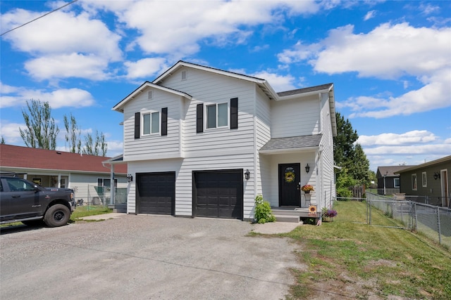 1483 Western Dr, Kalispell, MT 59901 - view of front of property with an attached garage and driveway
