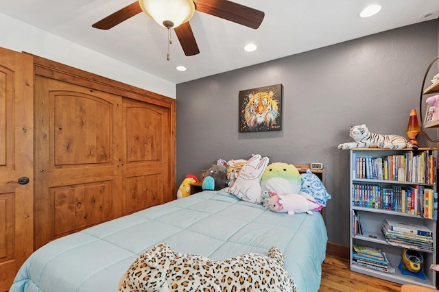 101 Heavens Peak Dr, Kalispell, MT 59901 - bedroom featuring wood finished floors, recessed lighting, and ceiling fan