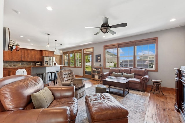 101 Heavens Peak Dr, Kalispell, MT 59901 - living area with light wood finished floors, recessed lighting, and ceiling fan