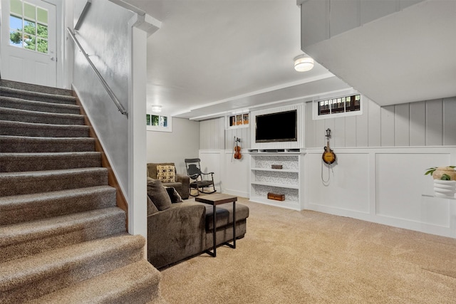 546 Woodworth Ave, Missoula, MT 59801 - living room with stairway, plenty of natural light, carpet flooring, and a decorative wall