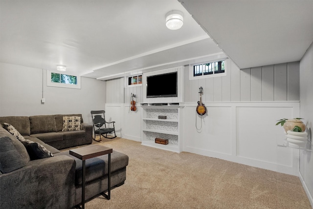546 Woodworth Ave, Missoula, MT 59801 - living area featuring light carpet, healthy amount of natural light, and a decorative wall