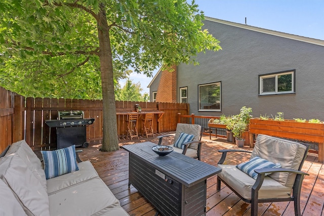 546 Woodworth Ave, Missoula, MT 59801 - wooden terrace featuring an outdoor hangout area and a grill