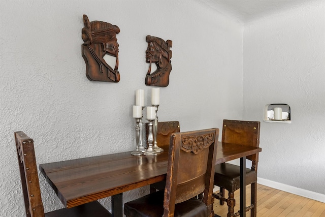 546 Woodworth Ave, Missoula, MT 59801 - dining space featuring wood finished floors and baseboards
