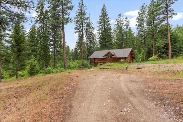 581 Timber Trl, Stevensville, MT 59870 - view of dirt / gravel road with a wooded view