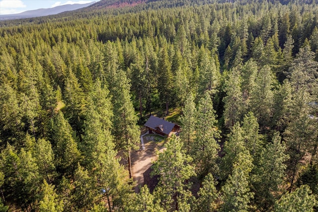 581 Timber Trl, Stevensville, MT 59870 - view from above of property with a heavily wooded area and a mountainous background