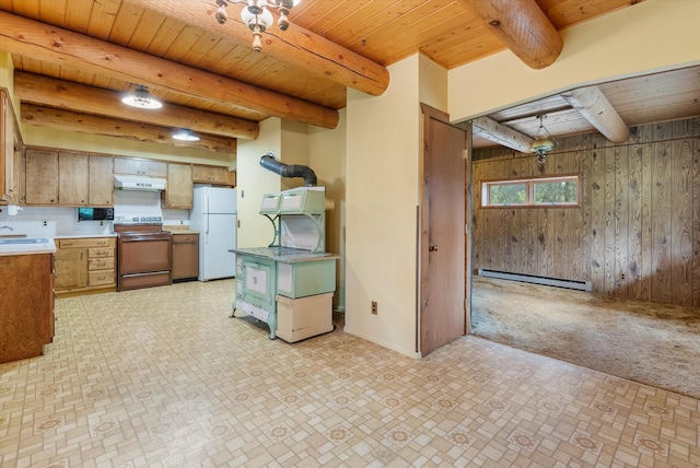 581 Timber Trl, Stevensville, MT 59870 - kitchen featuring electric range, freestanding refrigerator, a wood ceiling with exposed beams, baseboard heating, and under cabinet range hood