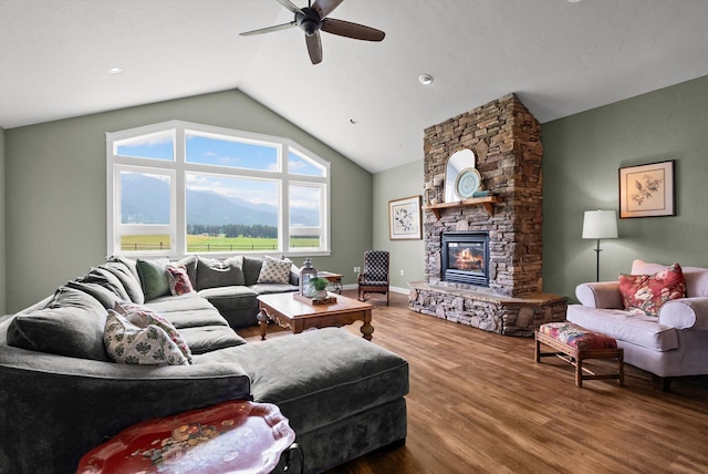 451 Creston Hatchery Rd, Kalispell, MT 59901 - living area with ceiling fan, vaulted ceiling, wood finished floors, and a fireplace