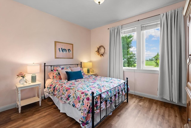 451 Creston Hatchery Rd, Kalispell, MT 59901 - bedroom with wood finished floors and baseboards