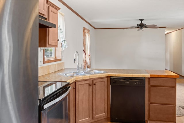 1100 E Oregon St Unit 13, Kalispell, MT 59901 - kitchen featuring stainless steel appliances, a peninsula, ceiling fan, and crown molding